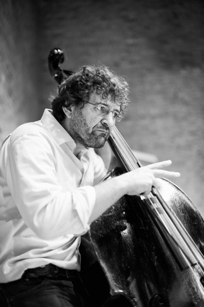 Zoran Marković playing his double-bass vigorously.